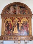 "Madonna in trono fra i santi (con lunetta riportante il Cristo Risorto) " - dipinto - 1470 - «Chiesa dei Santi Quirico e Giulitta» San Quirico d'Orcia (SI) - Italia